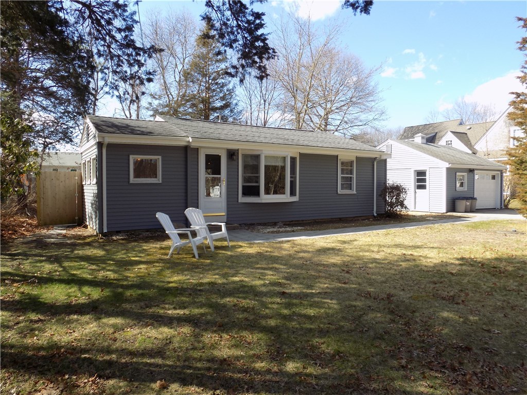 101 Ridgewood Road Charlestown, RI 02813 - Photo 1 of 25 Front of home with detached garage