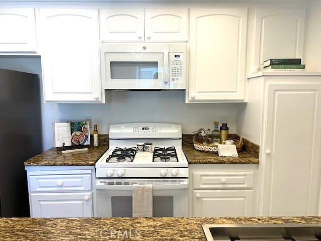 16040 Leffingwell Road, Unit 30 Whittier, CA 90603 - Photo 5 of 25 Updated kitchen with NEW stove, microwave, refrigerator, dishwasher, washer and dryer