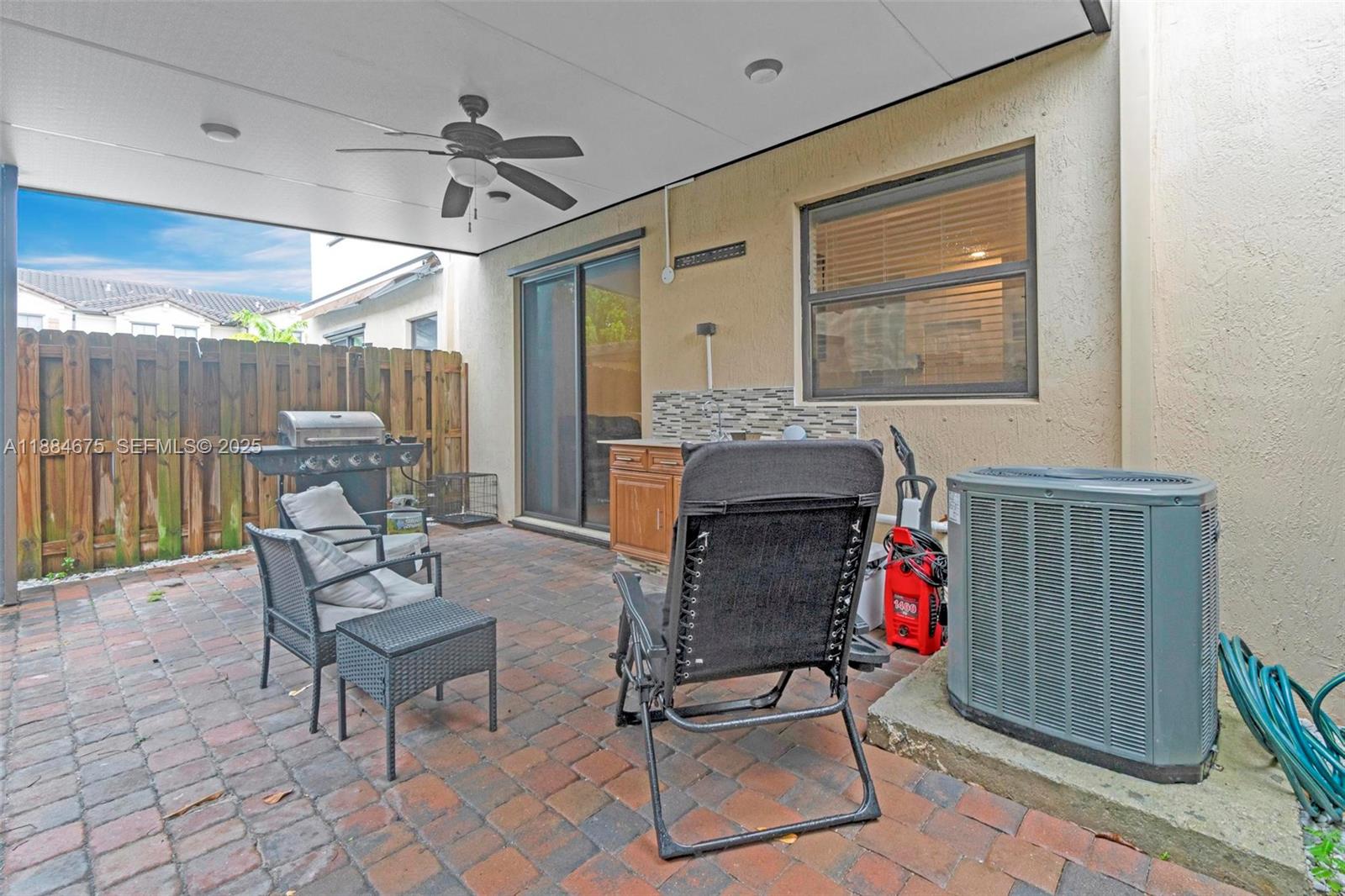 11413 Southwest 253rd Street, Unit 11413 Homestead, FL 33032 - Photo 28 of 44 a dining room with furniture and window
