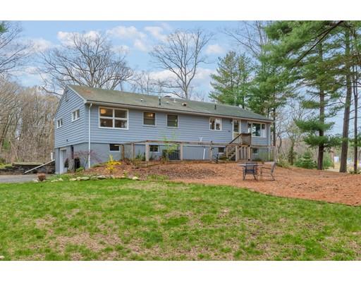 247 Sandy Pond Road Concord, MA 01773 - Photo 19 of 20 a front view of house with yard and seating area