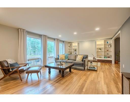 247 Sandy Pond Road Concord, MA 01773 - Photo 3 of 20 a living room with furniture and a wooden floor