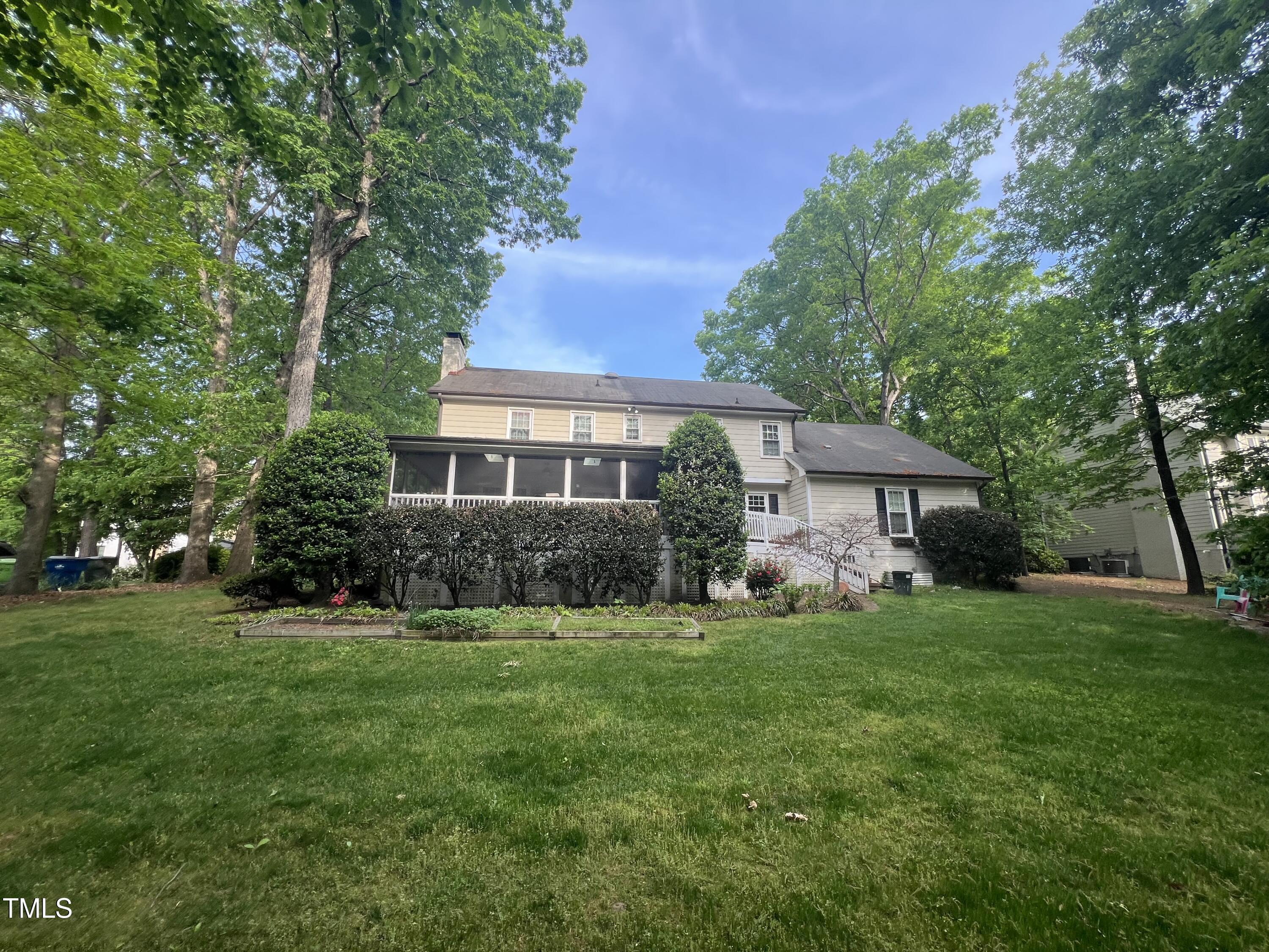 7824 Hardwick Drive Raleigh, NC 27615 - Photo 5 of 15 a front view of a house with a yard