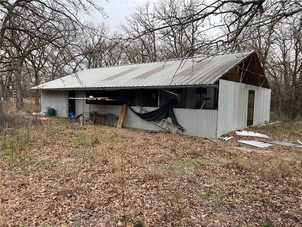 620 Cr 109 Road Riesel, TX 76682 - Photo 23 of 27 a view of a house with a yard and large tree