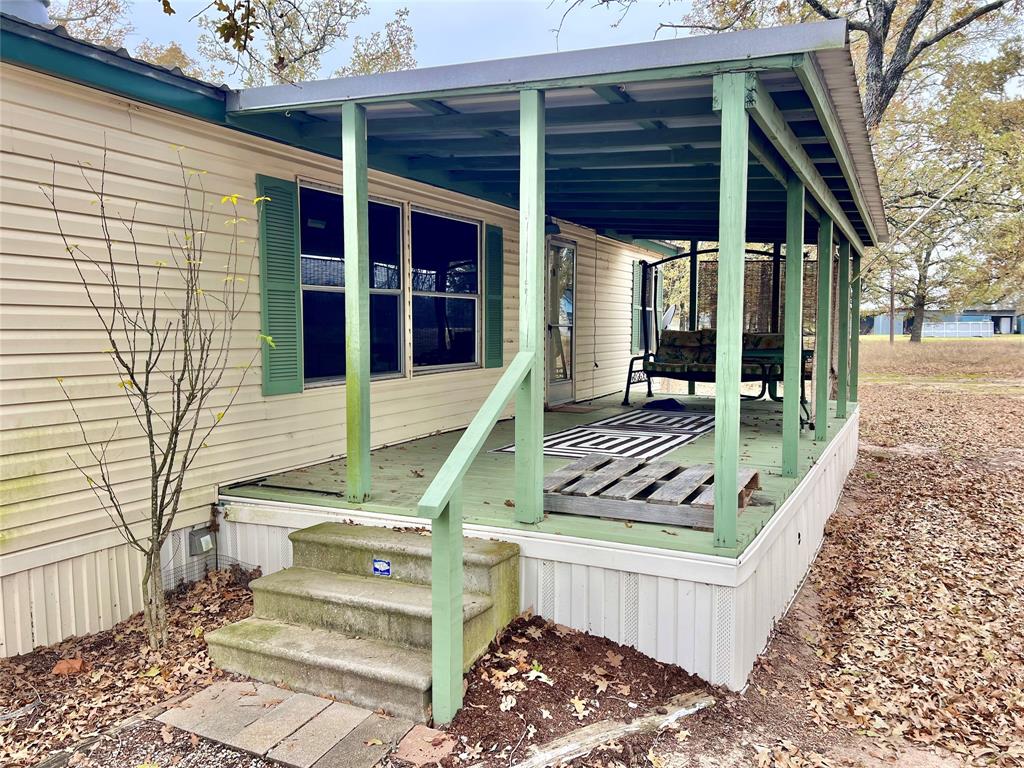 620 Cr 109 Road Riesel, TX 76682 - Photo 3 of 26 a view of a two chairs in the patio