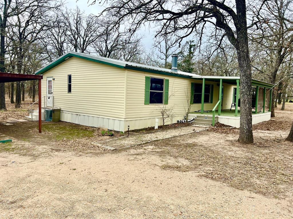 620 Cr 109 Road Riesel, TX 76682 - Photo 3 of 27 a view of a house with a yard