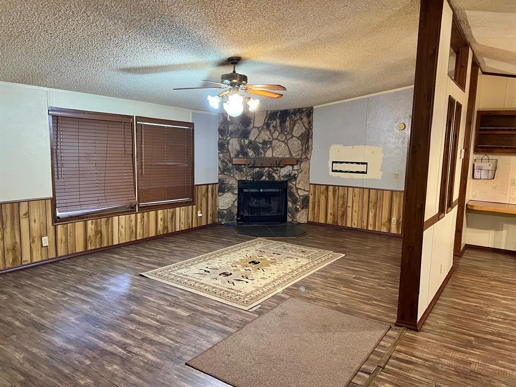 620 Cr 109 Road Riesel, TX 76682 - Photo 5 of 26 a view of a hallway with wooden floor and stairs