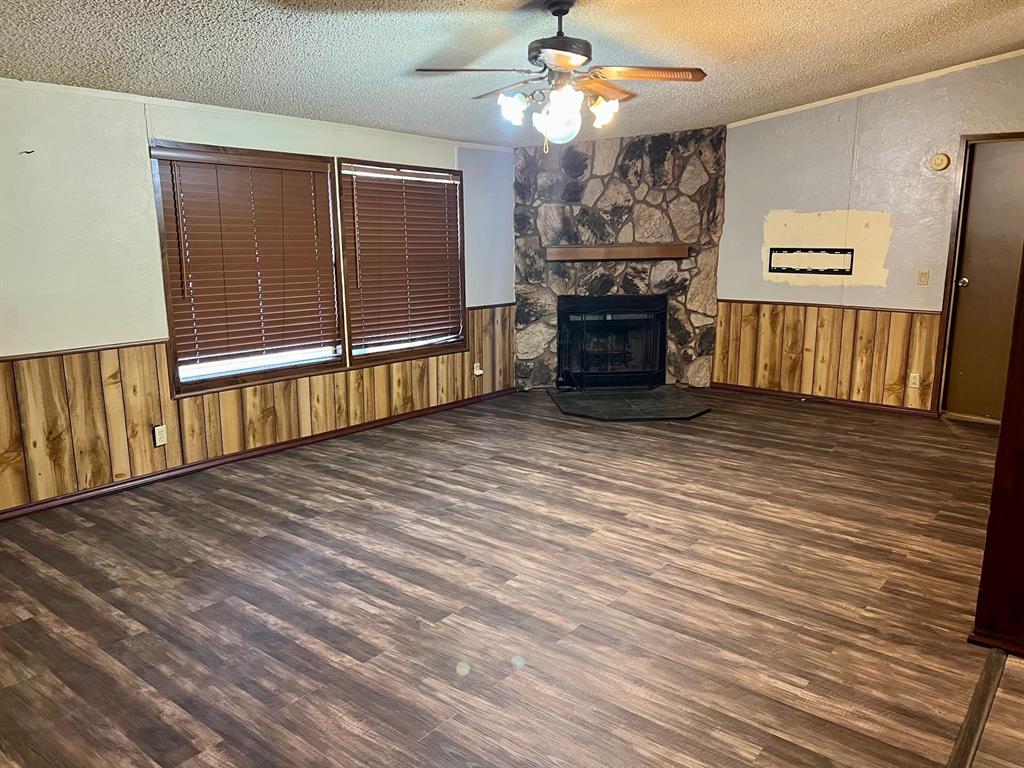 620 Cr 109 Road Riesel, TX 76682 - Photo 8 of 27 a view of a livingroom with a fireplace
