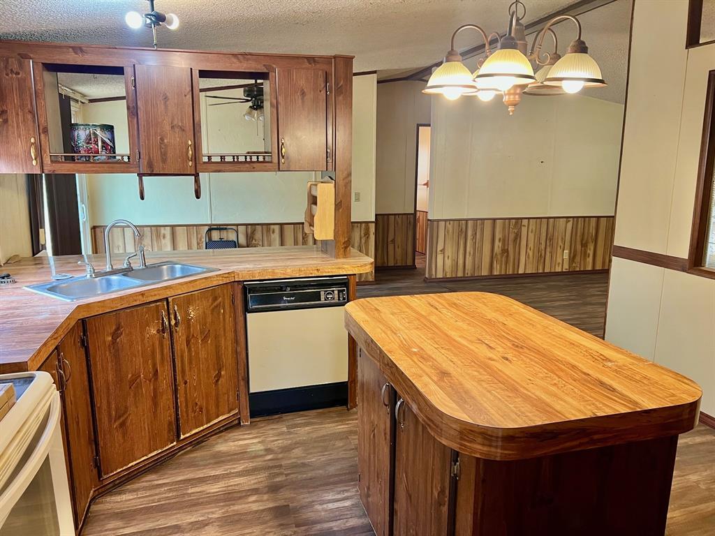 620 Cr 109 Road Riesel, TX 76682 - Photo 9 of 27 a kitchen with a sink and cabinets