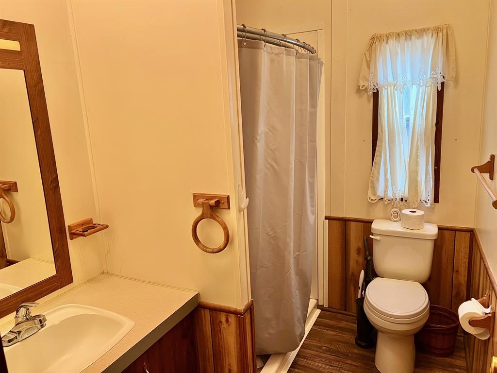 620 Cr 109 Road Riesel, TX 76682 - Photo 10 of 27 a bathroom with a sink toilet and shower