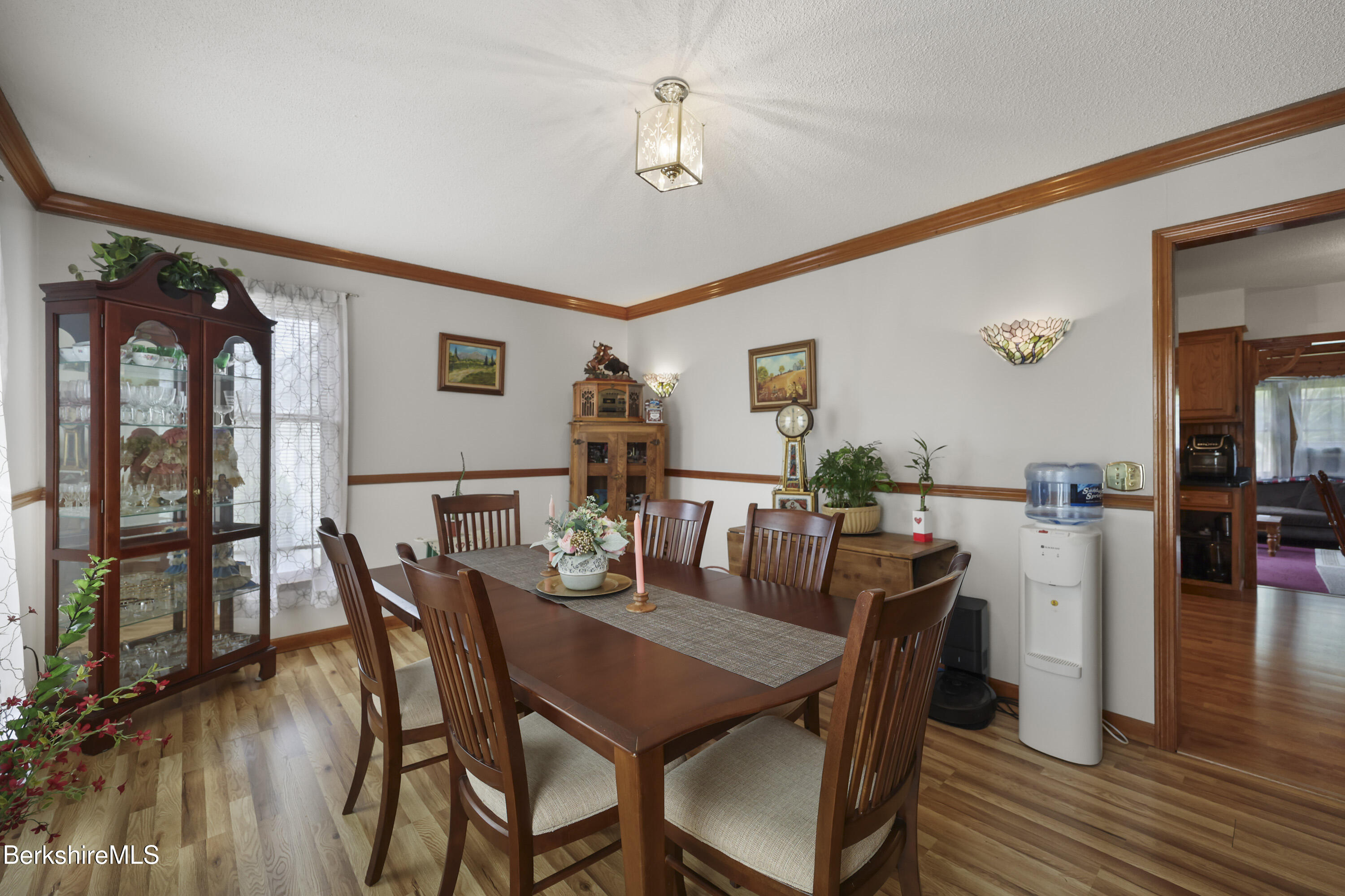 712 Barker Road Pittsfield, MA 01201 - Photo 17 of 39 a view of a dining room with furniture and wooden floor