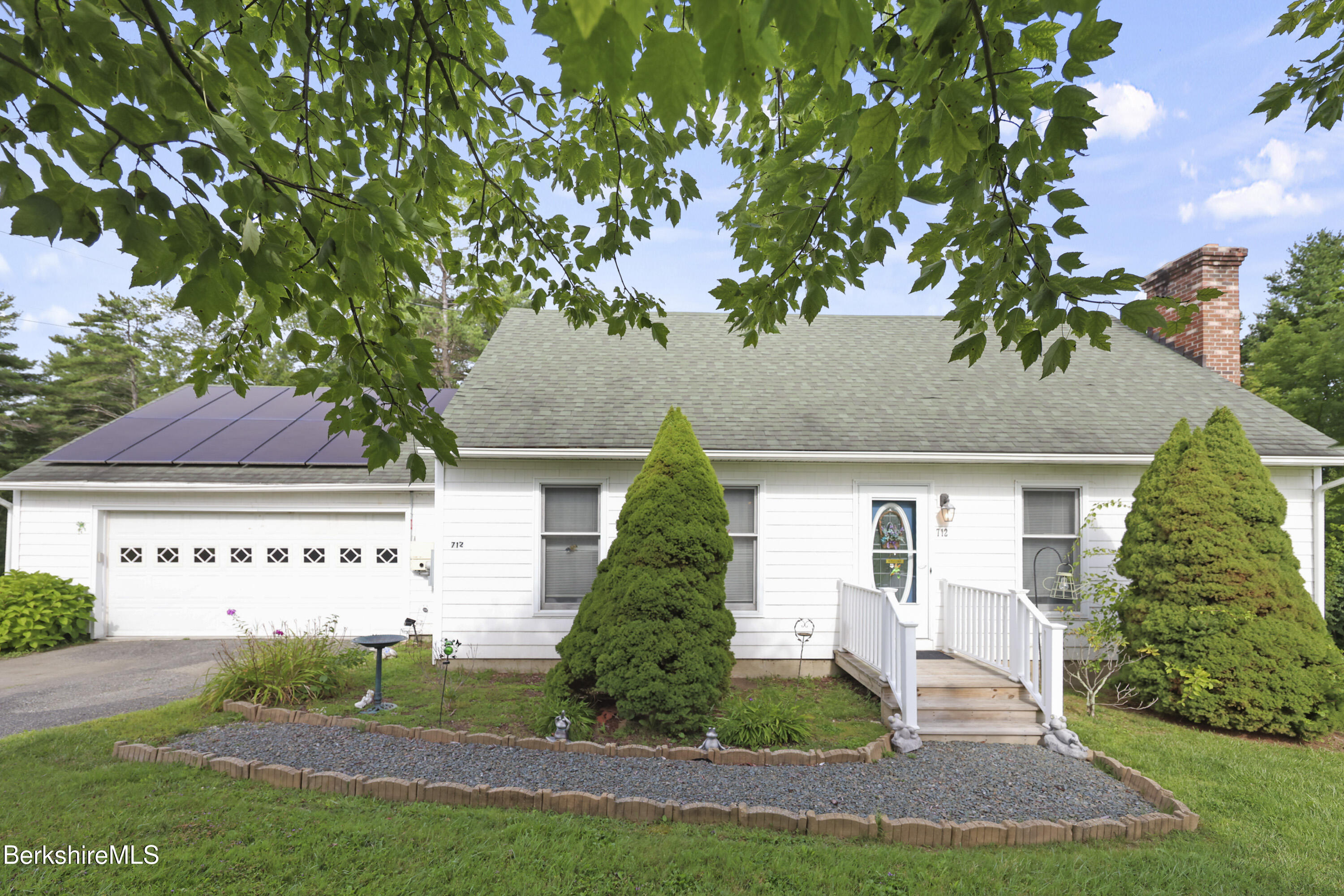 712 Barker Road Pittsfield, MA 01201 - Photo 3 of 39 front view of a house with a yard