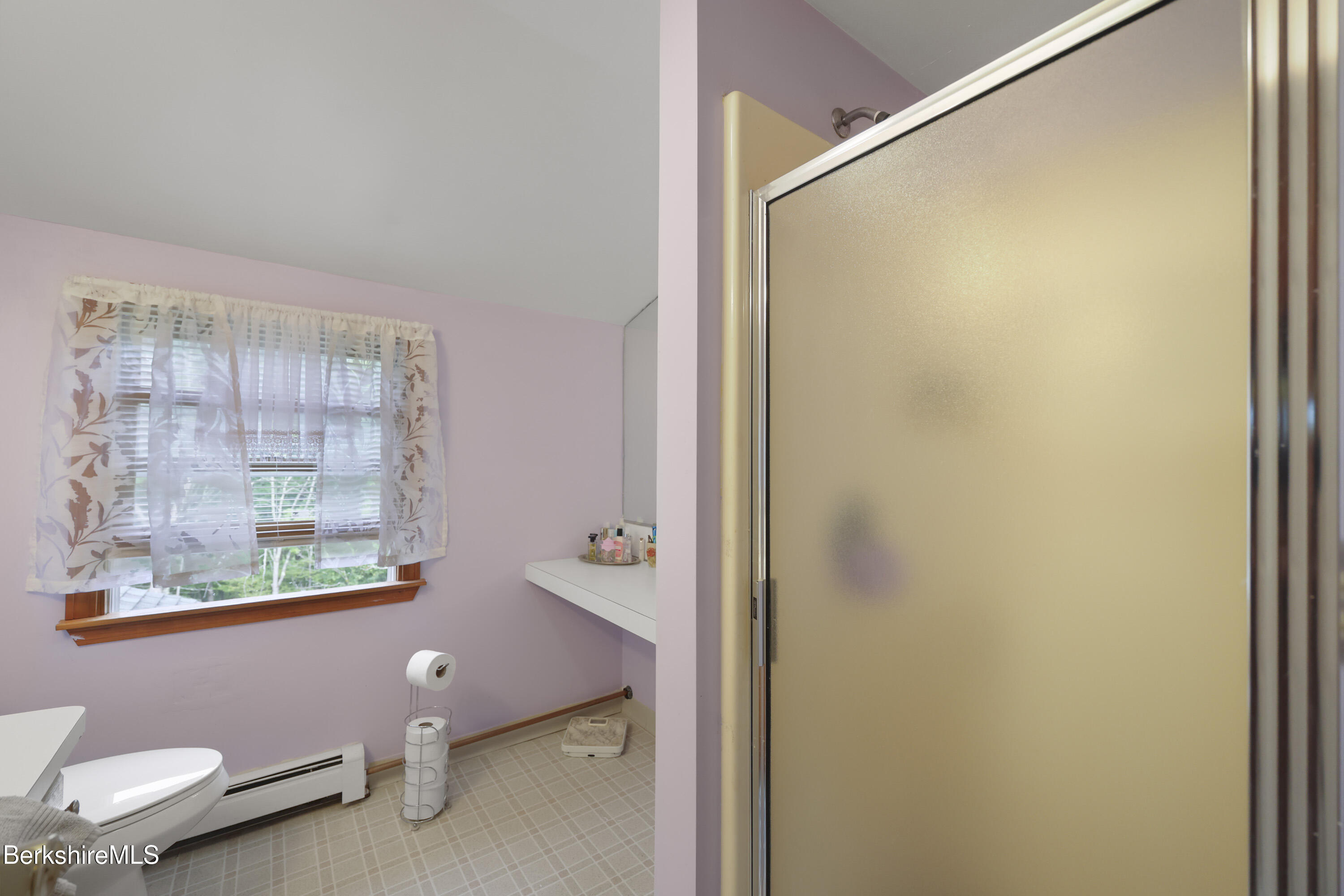 712 Barker Road Pittsfield, MA 01201 - Photo 32 of 39 a bedroom with a bed and a window