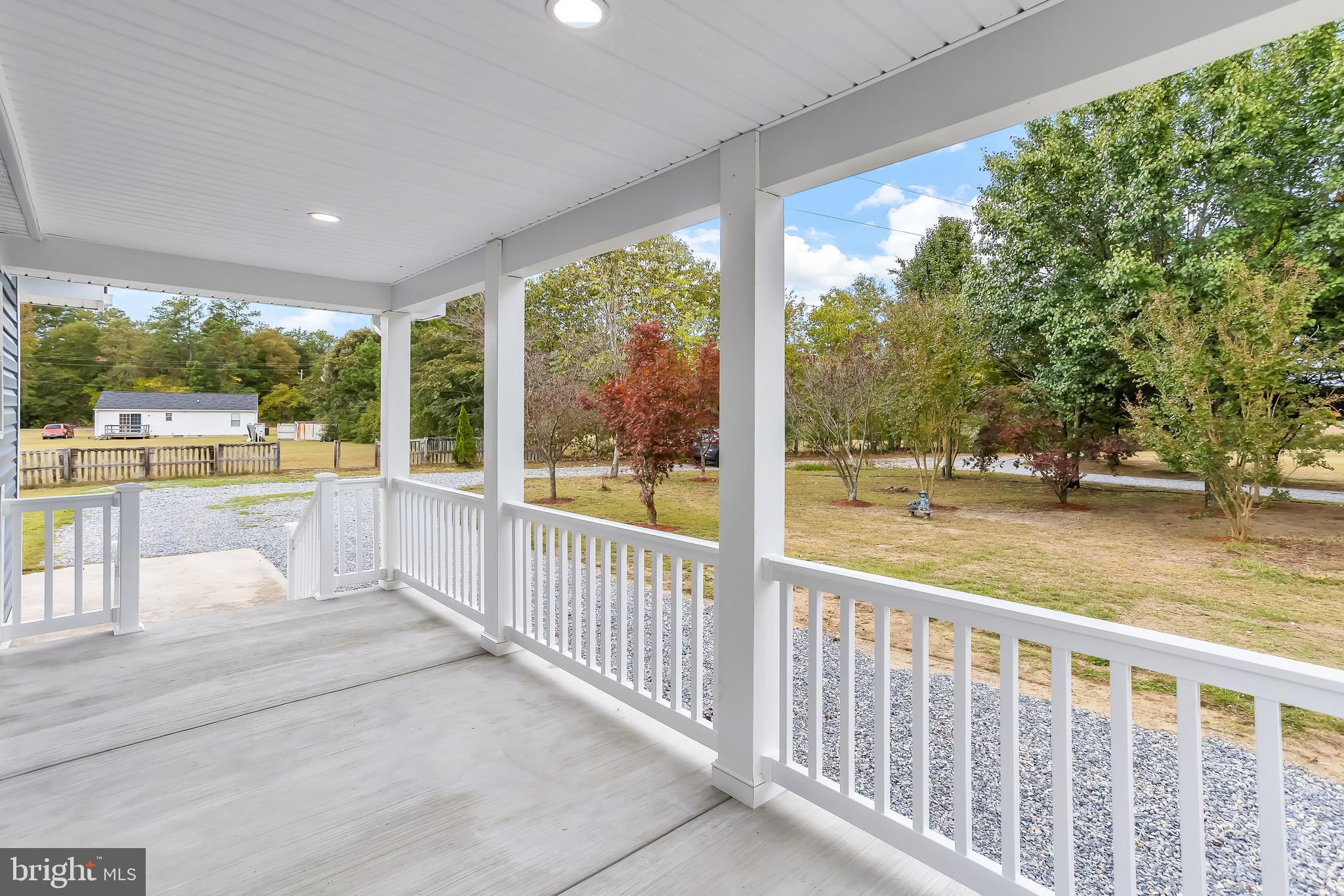26519 Siloam Road Salisbury, MD 21801 - Photo 7 of 69 a view of a porch and garden