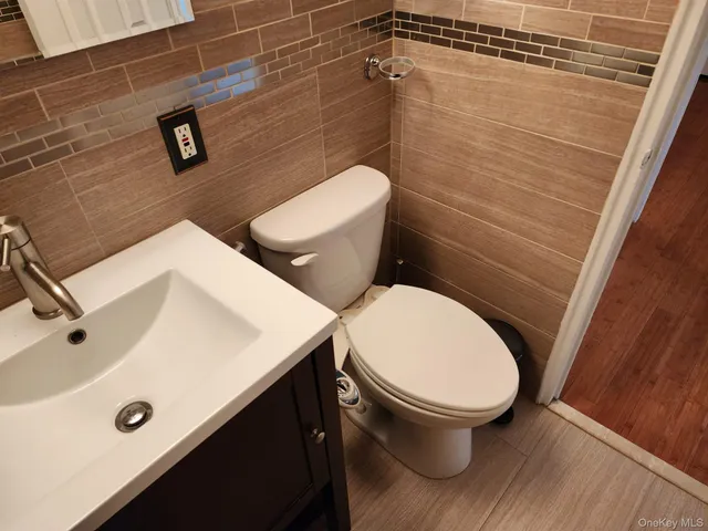 a bathroom with a sink and mirror