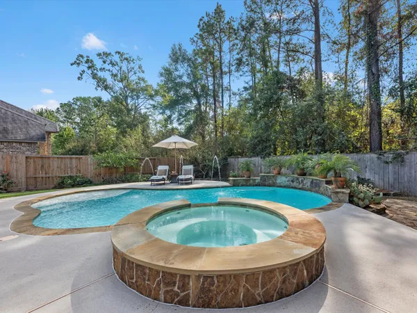 a front view of a house with swimming pool