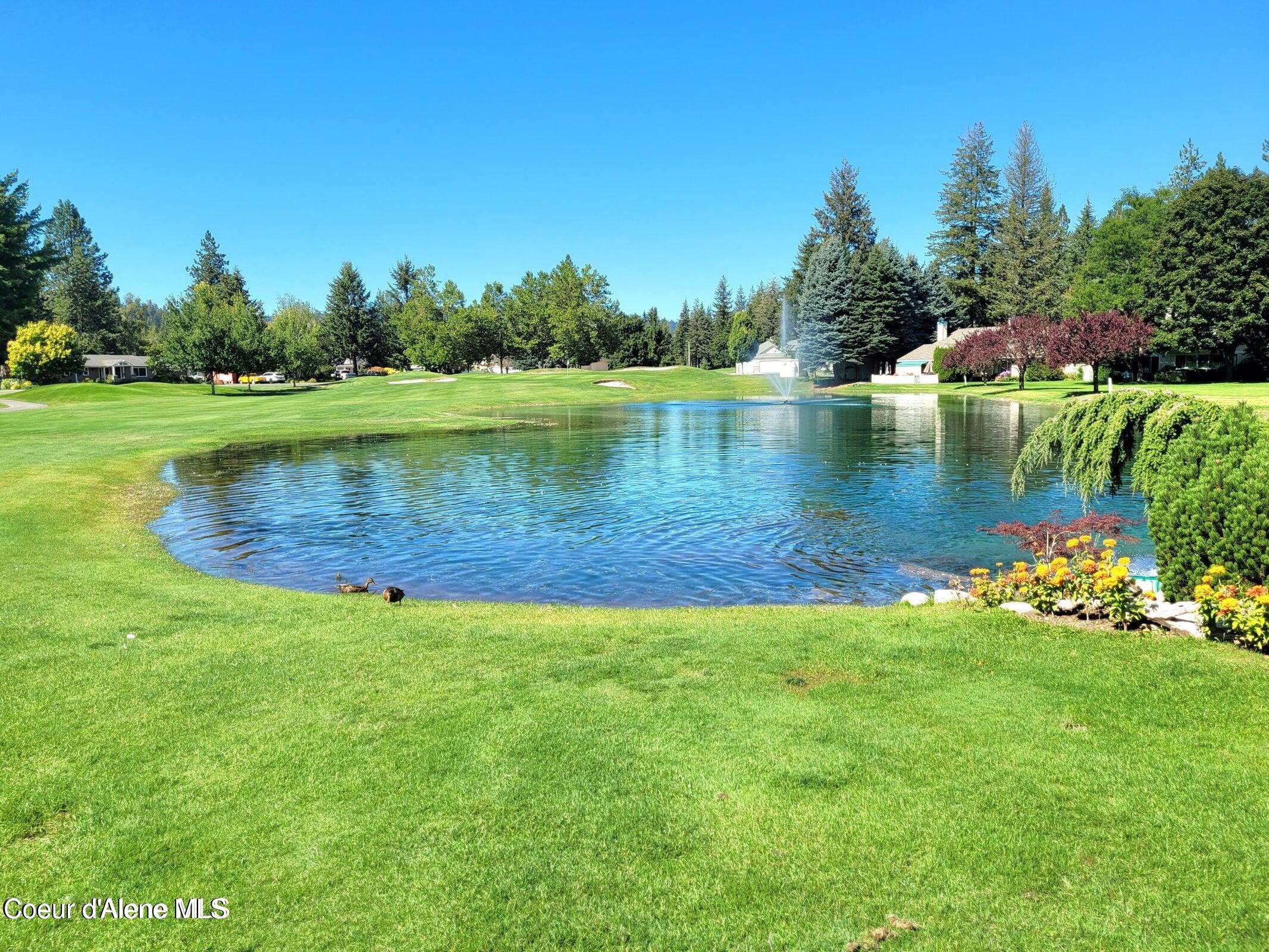 5305 West Fairway Lane, Unit 21 Rathdrum, ID 83858 - Photo 42 of 45 15th Tee Pond Stocked with Rainbow Trout