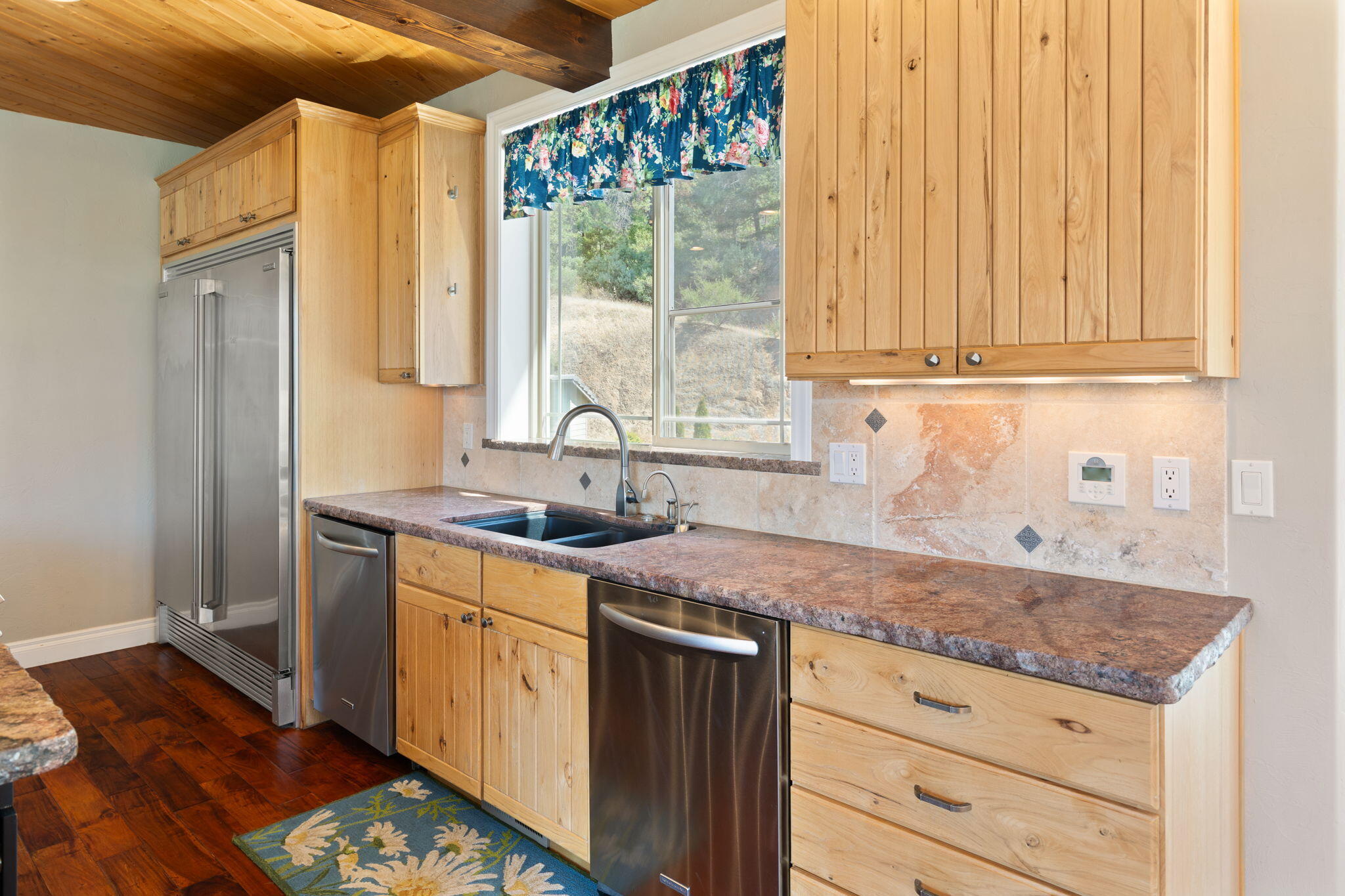7304 North Applegate Road Grants Pass, OR 97527 - Photo 11 of 87 a kitchen with stainless steel appliances granite countertop a sink stove and cabinets