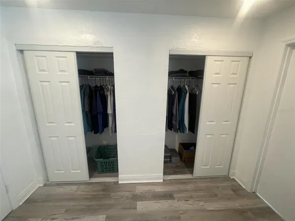 an entryway door with a hallway