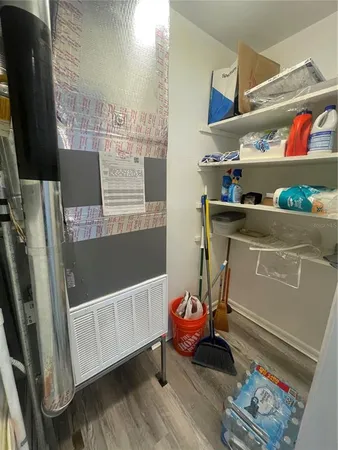 a room with storage and utility