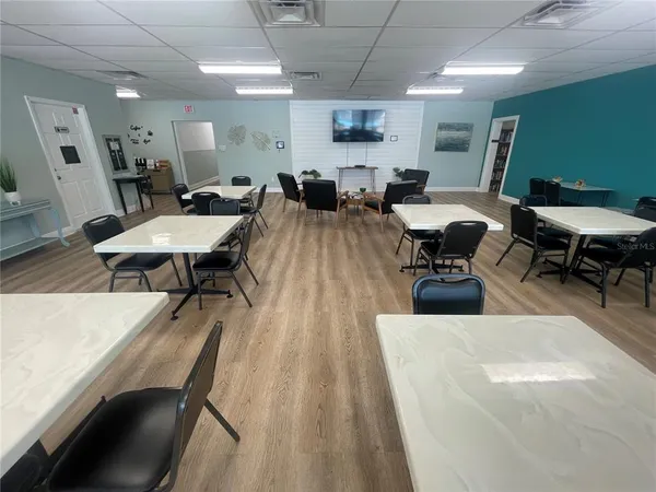 an room with pool tables