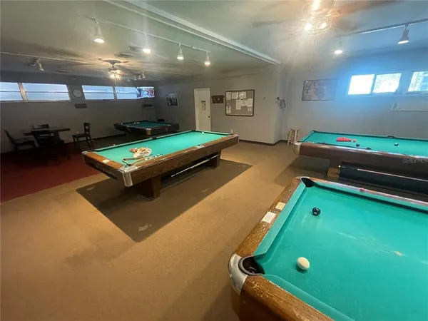 a view of a lake with a house in the background