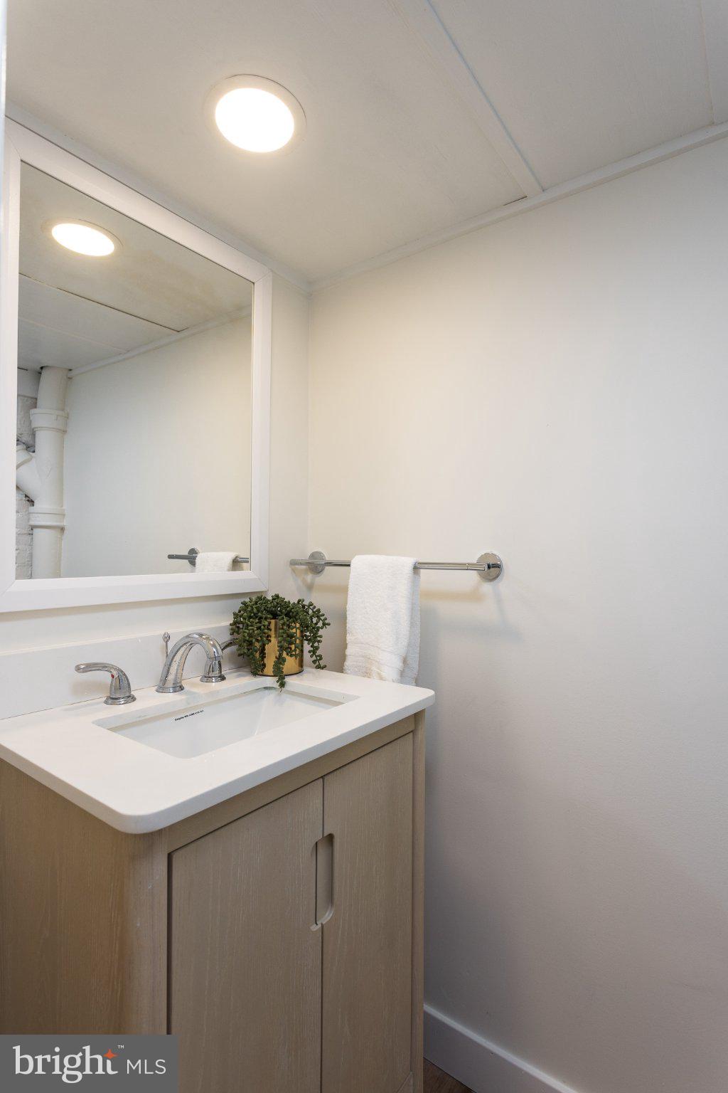7005 Copeleigh Road Baltimore, MD 21212 - Photo 45 of 51 Sleek and modern bathroom oasis.