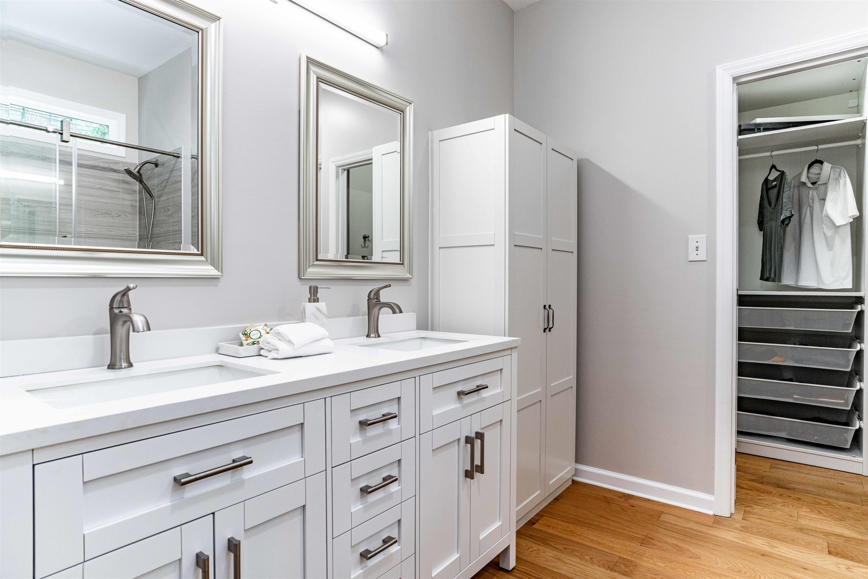 407 Catlin Road Cary, NC 27519 - Photo 14 of 42 a en suite bathroom with a granite countertop sink and a mirror