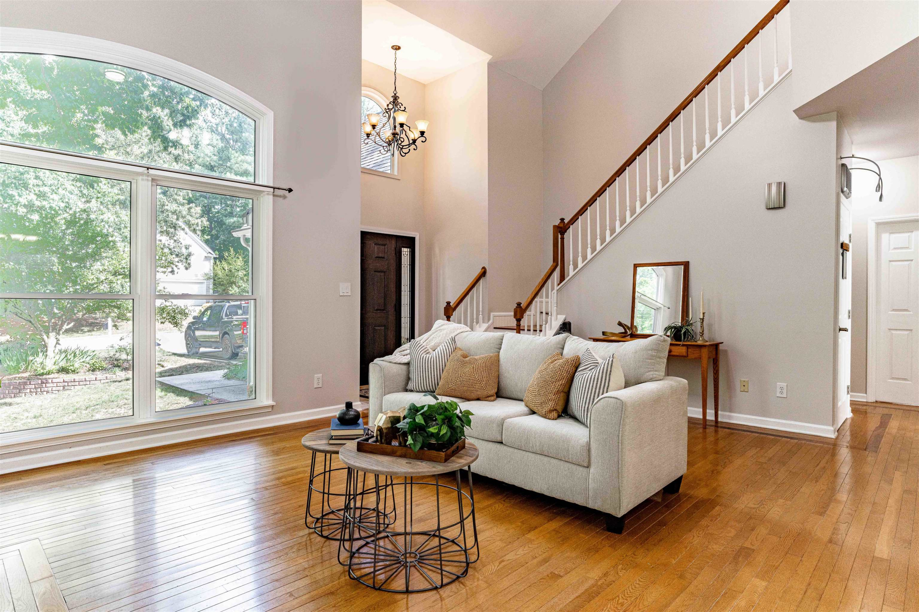407 Catlin Road Cary, NC 27519 - Photo 19 of 42 a living room with furniture and wooden floor