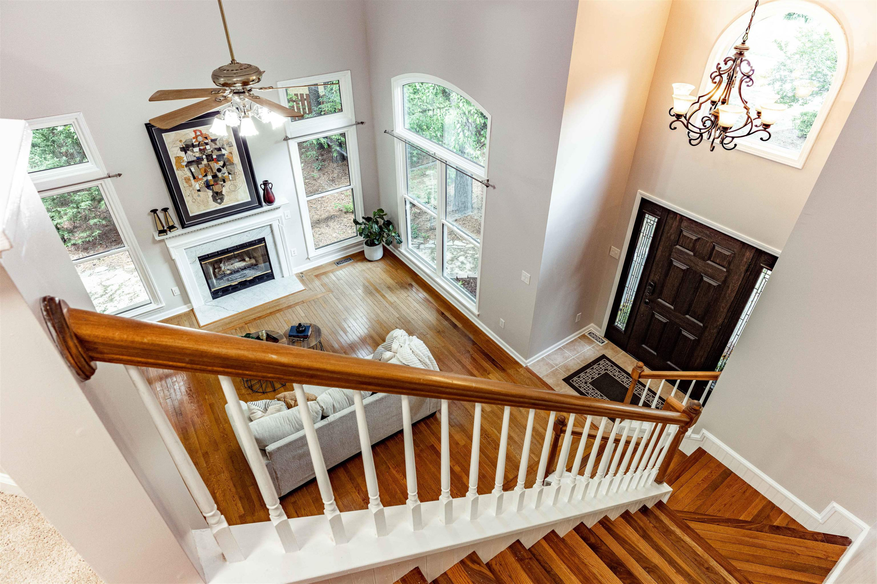 407 Catlin Road Cary, NC 27519 - Photo 20 of 42 a view of a hallway with wooden floor and windows