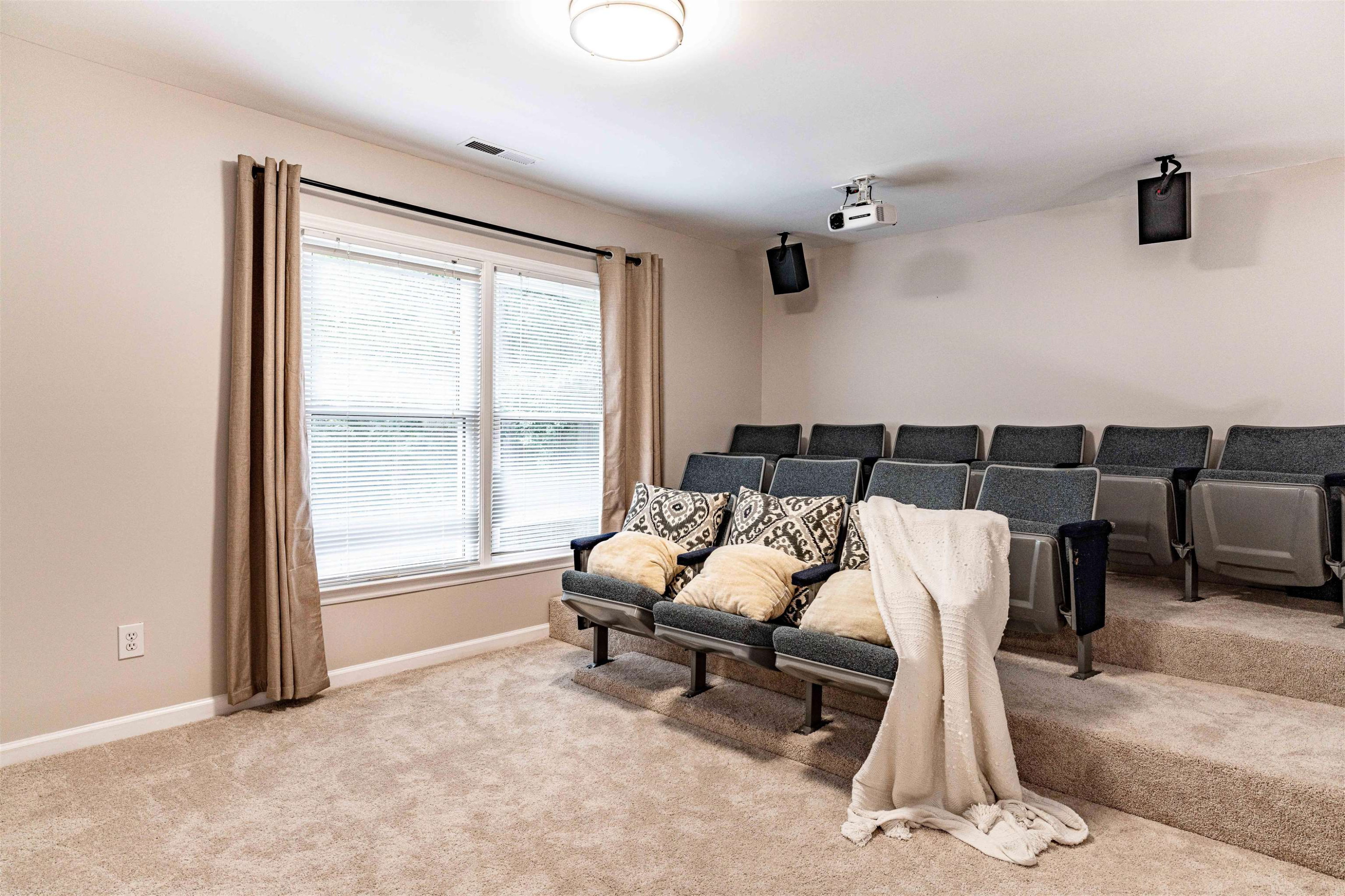 407 Catlin Road Cary, NC 27519 - Photo 21 of 42 a bedroom with furniture and a large window