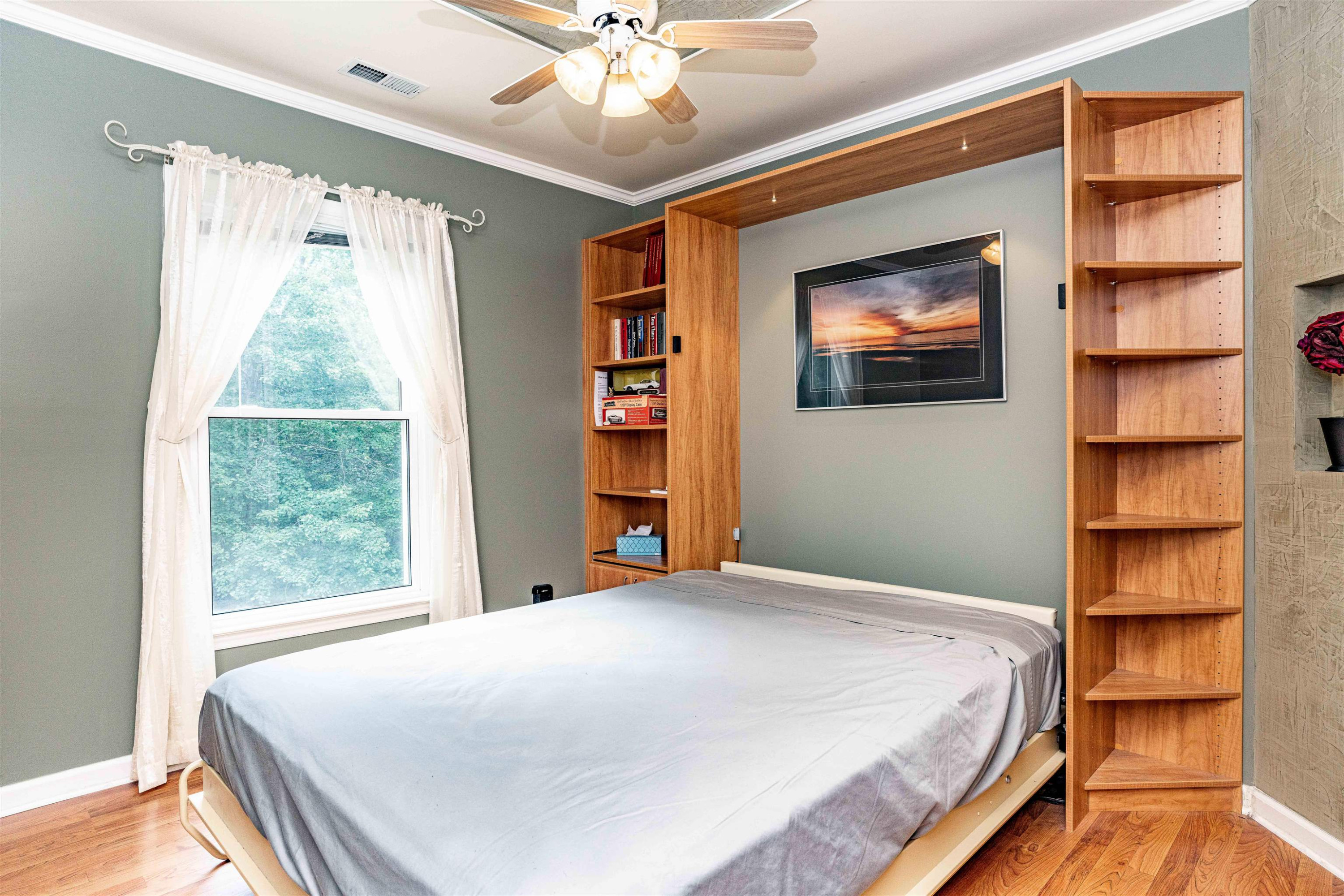 407 Catlin Road Cary, NC 27519 - Photo 24 of 42 a bedroom with a bed and a window