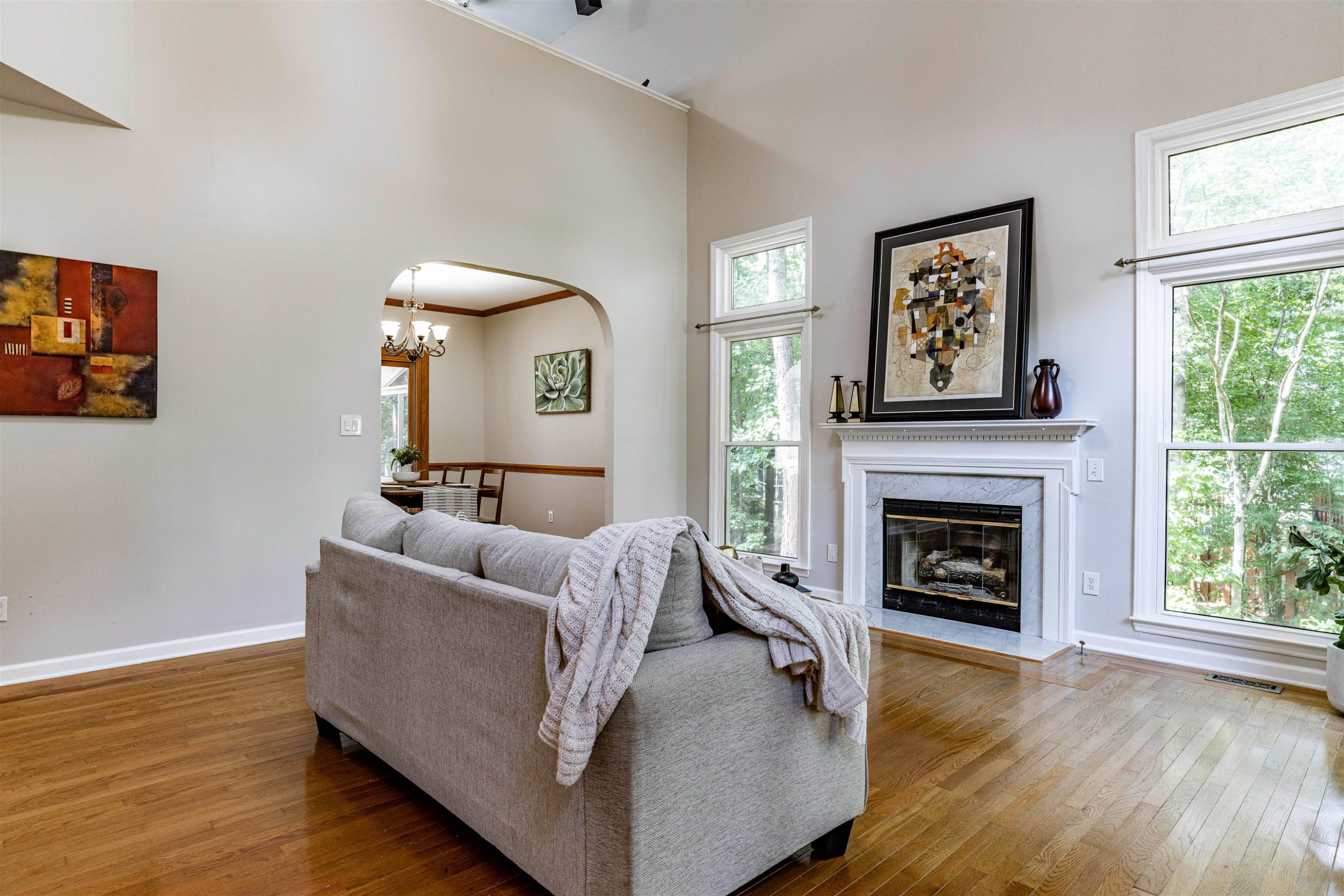 407 Catlin Road Cary, NC 27519 - Photo 30 of 42 a living room with furniture and a fireplace