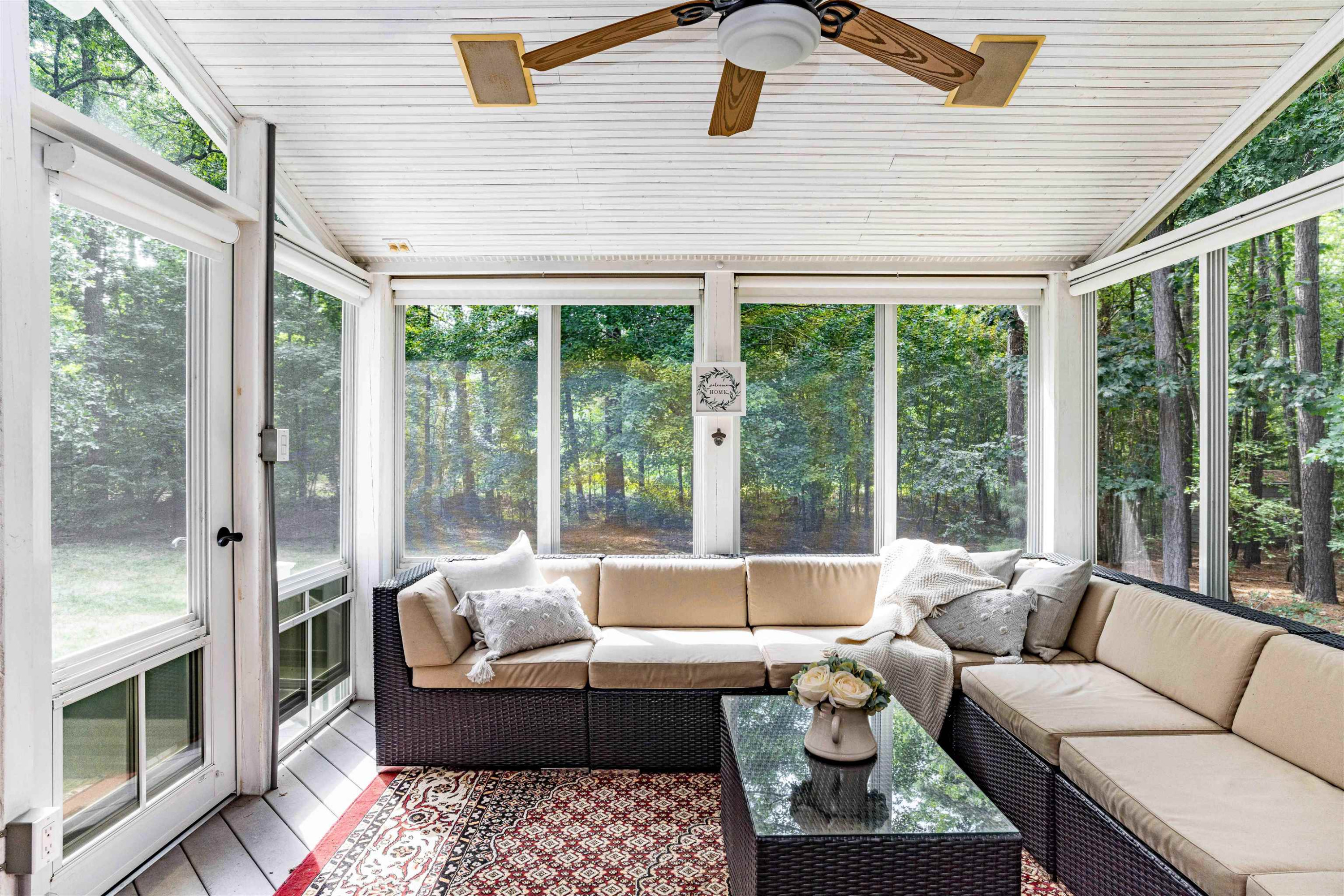 407 Catlin Road Cary, NC 27519 - Photo 32 of 42 a living room with furniture and a large window
