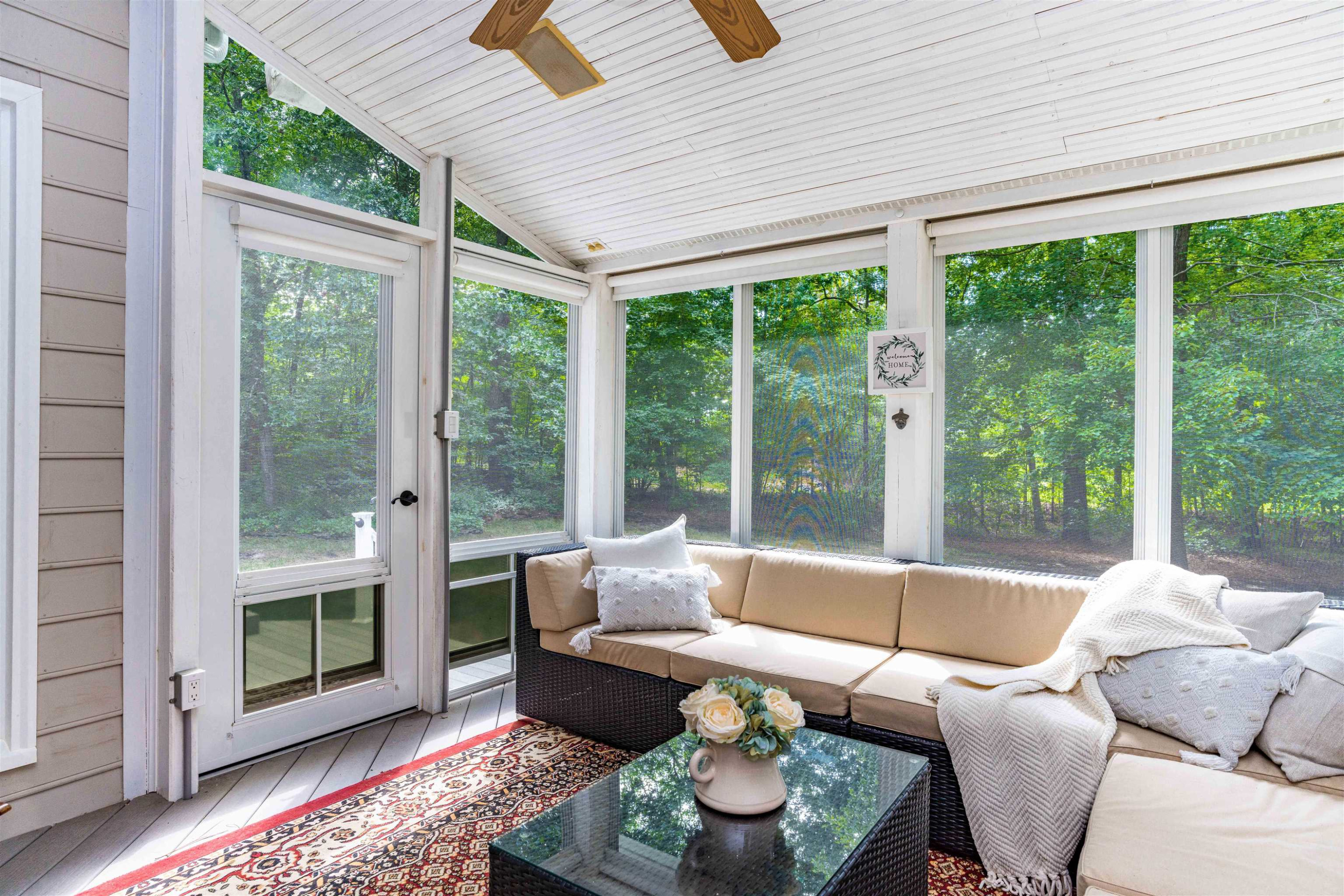 407 Catlin Road Cary, NC 27519 - Photo 33 of 42 a living room with furniture and a large window
