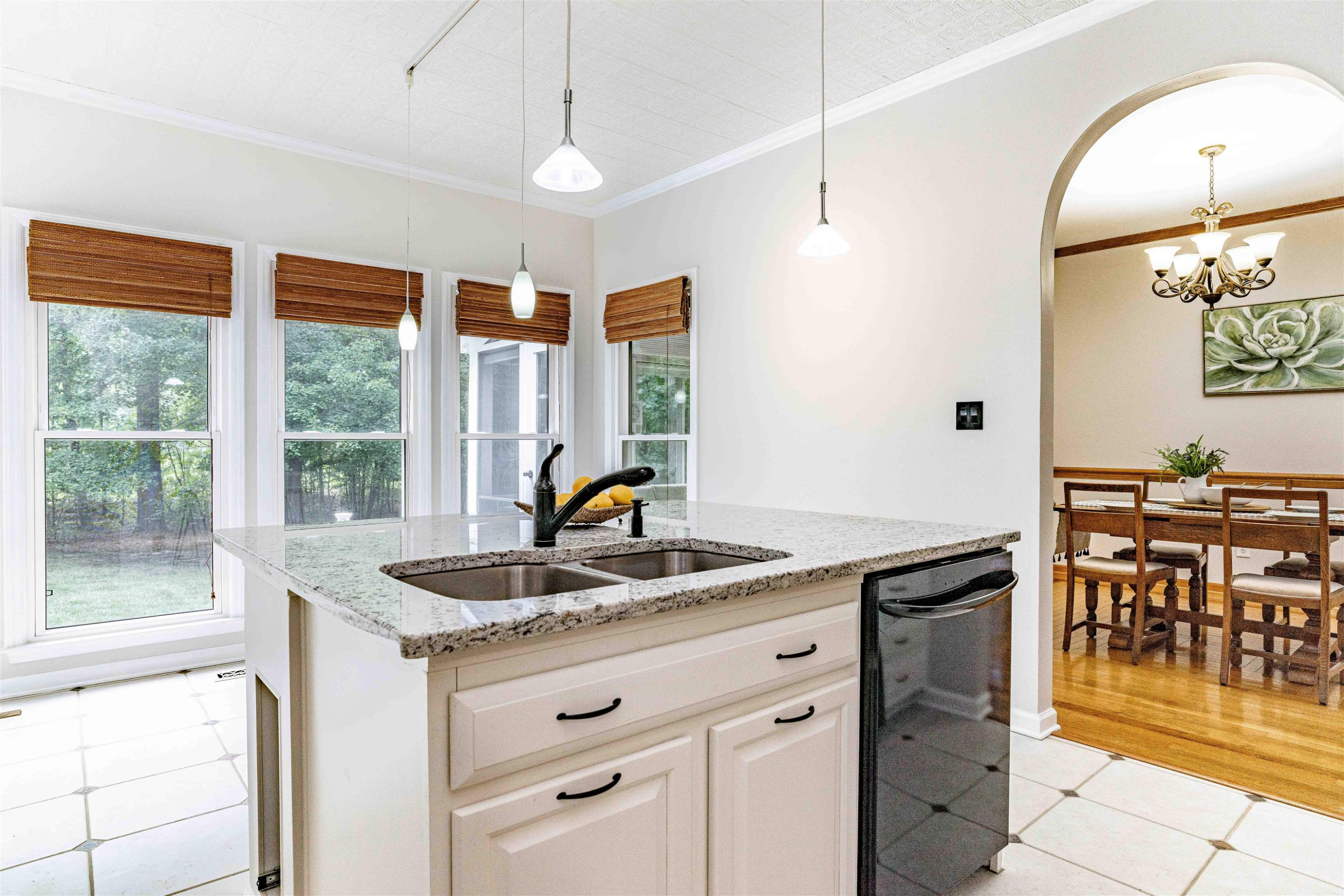 407 Catlin Road Cary, NC 27519 - Photo 10 of 42 a kitchen with stainless steel appliances granite countertop a sink and a granite counter tops