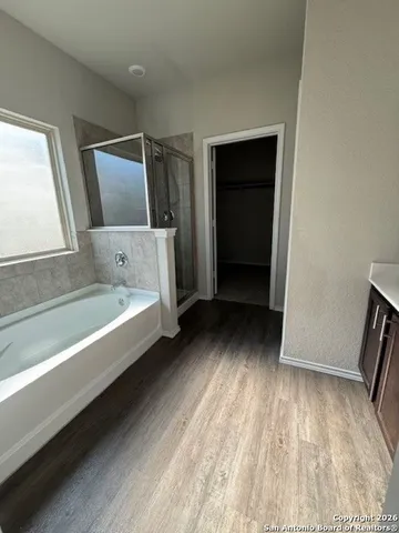 a bathroom with a sink and a bathtub