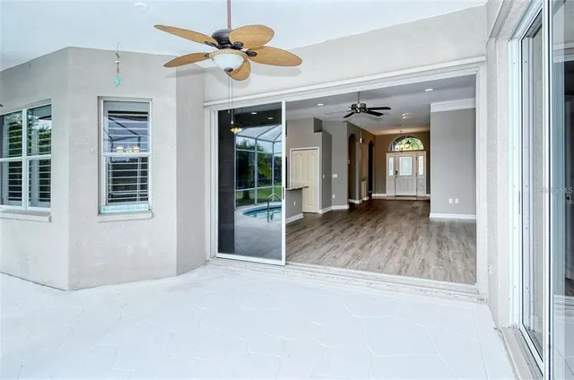 a view of kitchen with cabinets and wooden floor