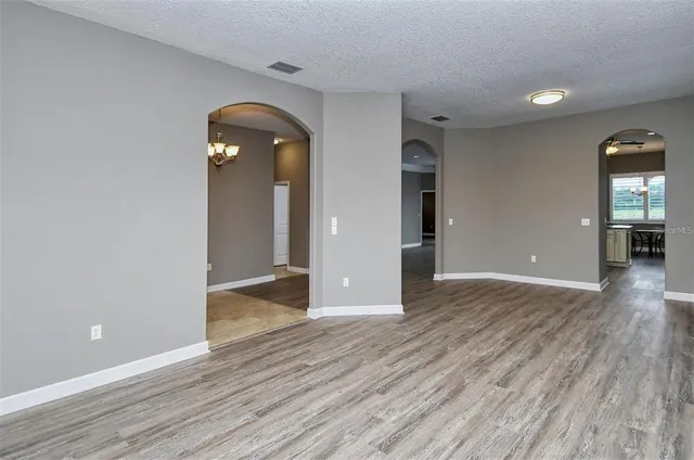 a view of a swimming pool with a patio