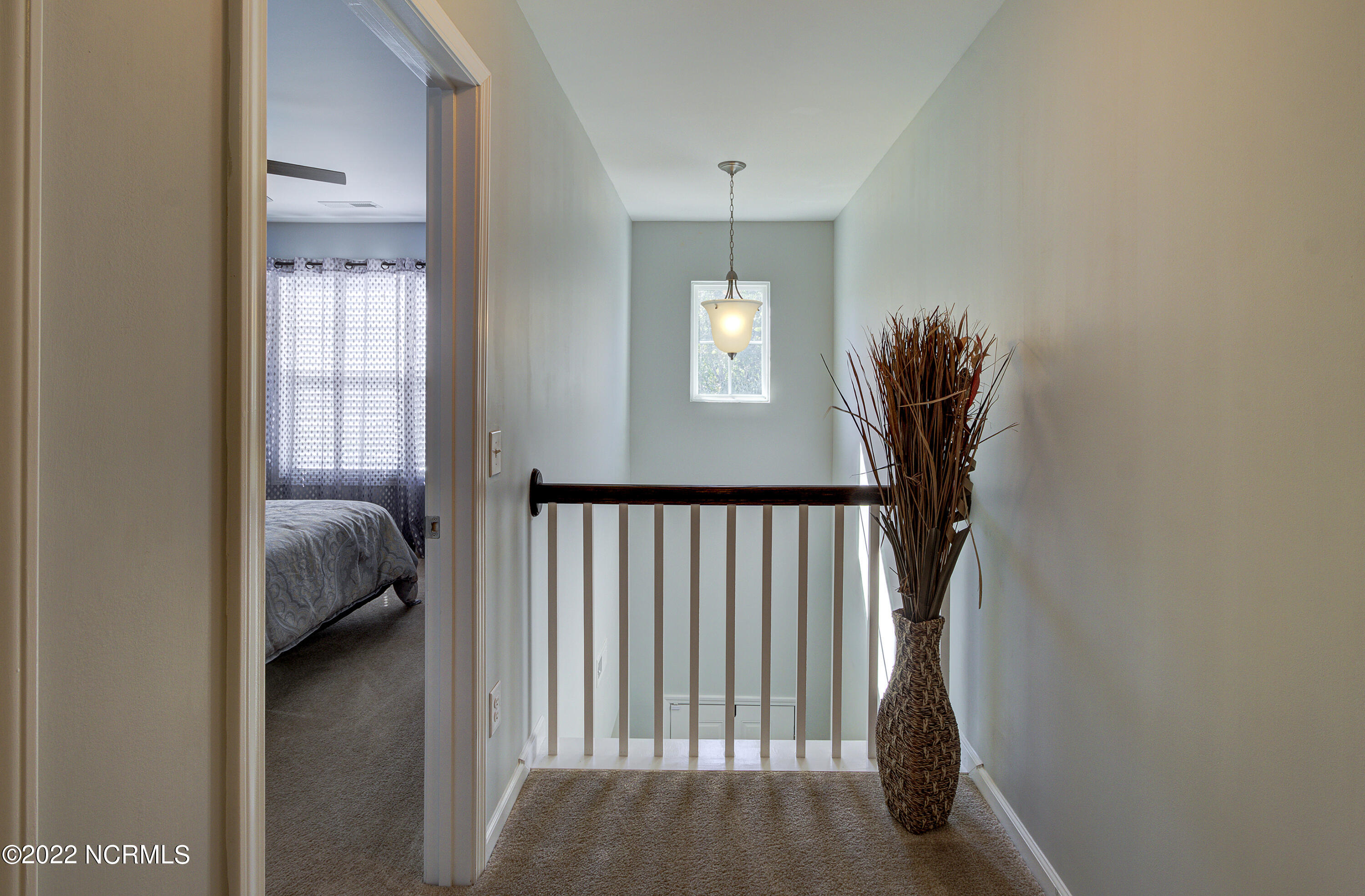 322 Bulkhead Bend Calabash, NC 28467 - Photo 28 of 49 Landing at top of stairs overlooking front entry and foyer