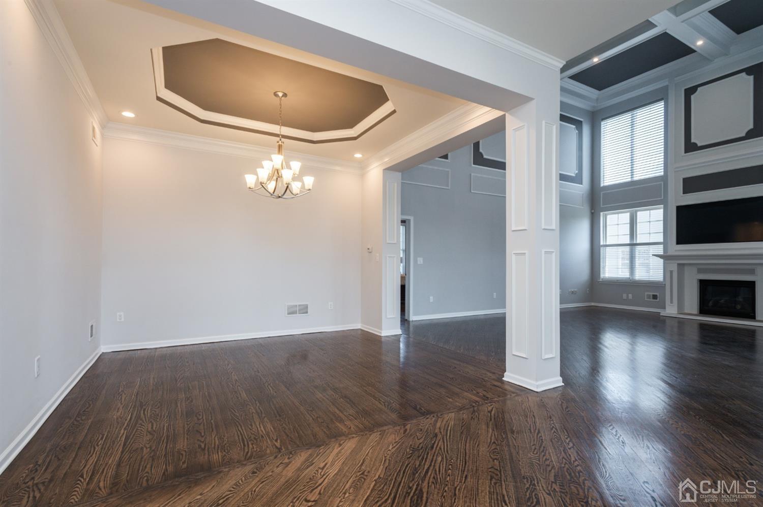 57 Kings Mill Road Monroe Township, NJ 08831 - Photo 12 of 44 Dining Room with Tray Ceiling, Recessed Lights, Custom Moldings, Note the Coffered Ceiling in the Great Room