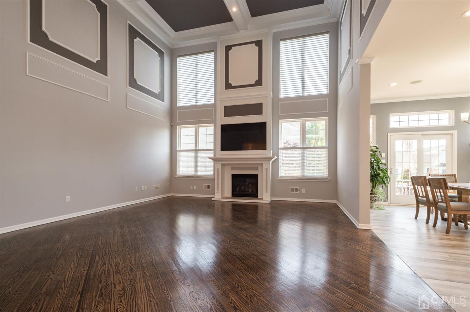 57 Kings Mill Road Monroe Township, NJ 08831 - Photo 13 of 44 Two-Story Great Room, Gas Fireplace, Recessed Lights, Coffered Ceiling, Open to Kitchen, Dining Room. This is THE HOUSE FOR YOU!