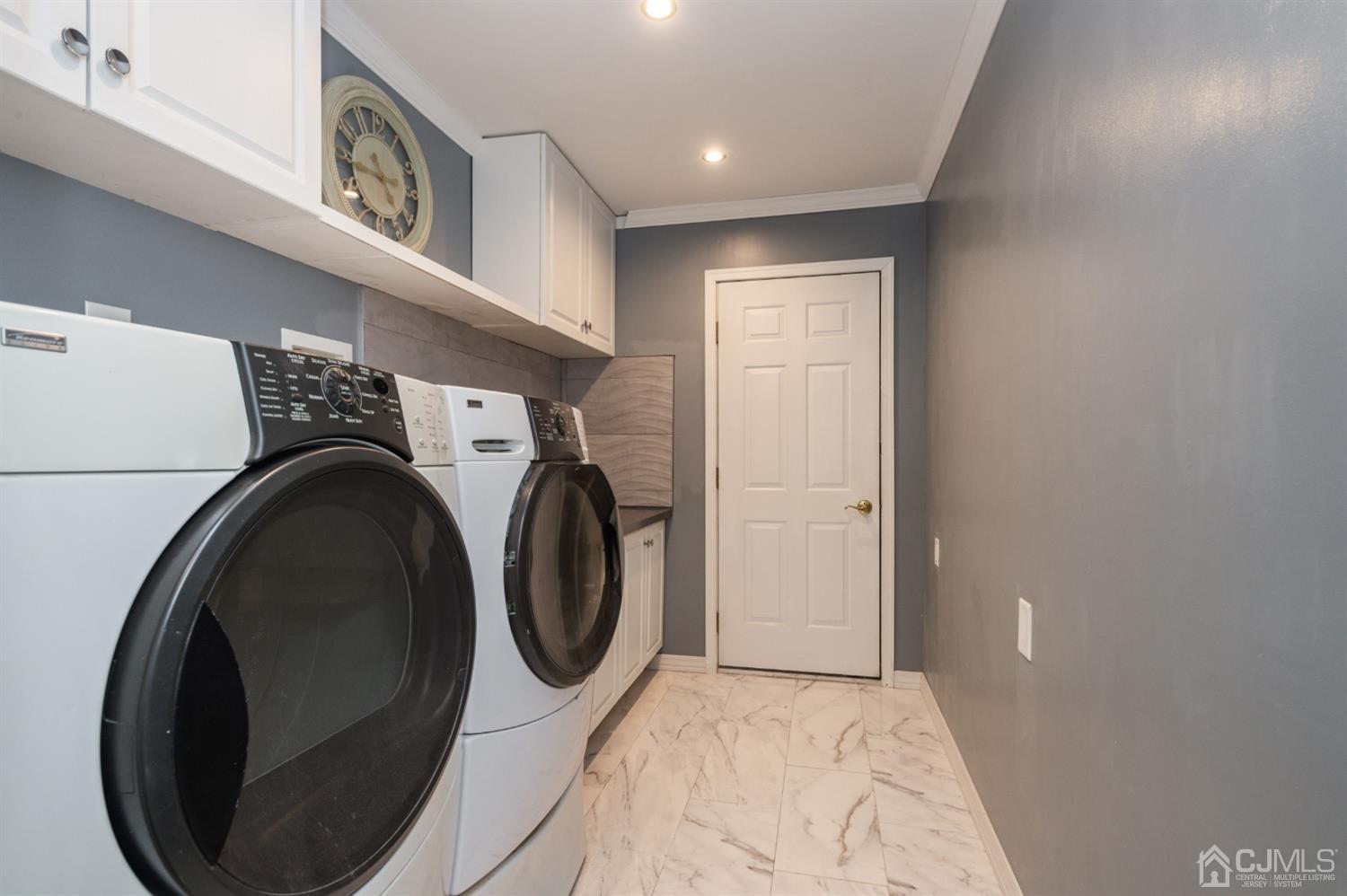 57 Kings Mill Road Monroe Township, NJ 08831 - Photo 28 of 44 NEW Laundry Room, Washer and Dryer Included, Cabinetry, Sink with Vanity, Door Leads to Garage which also has a SINK