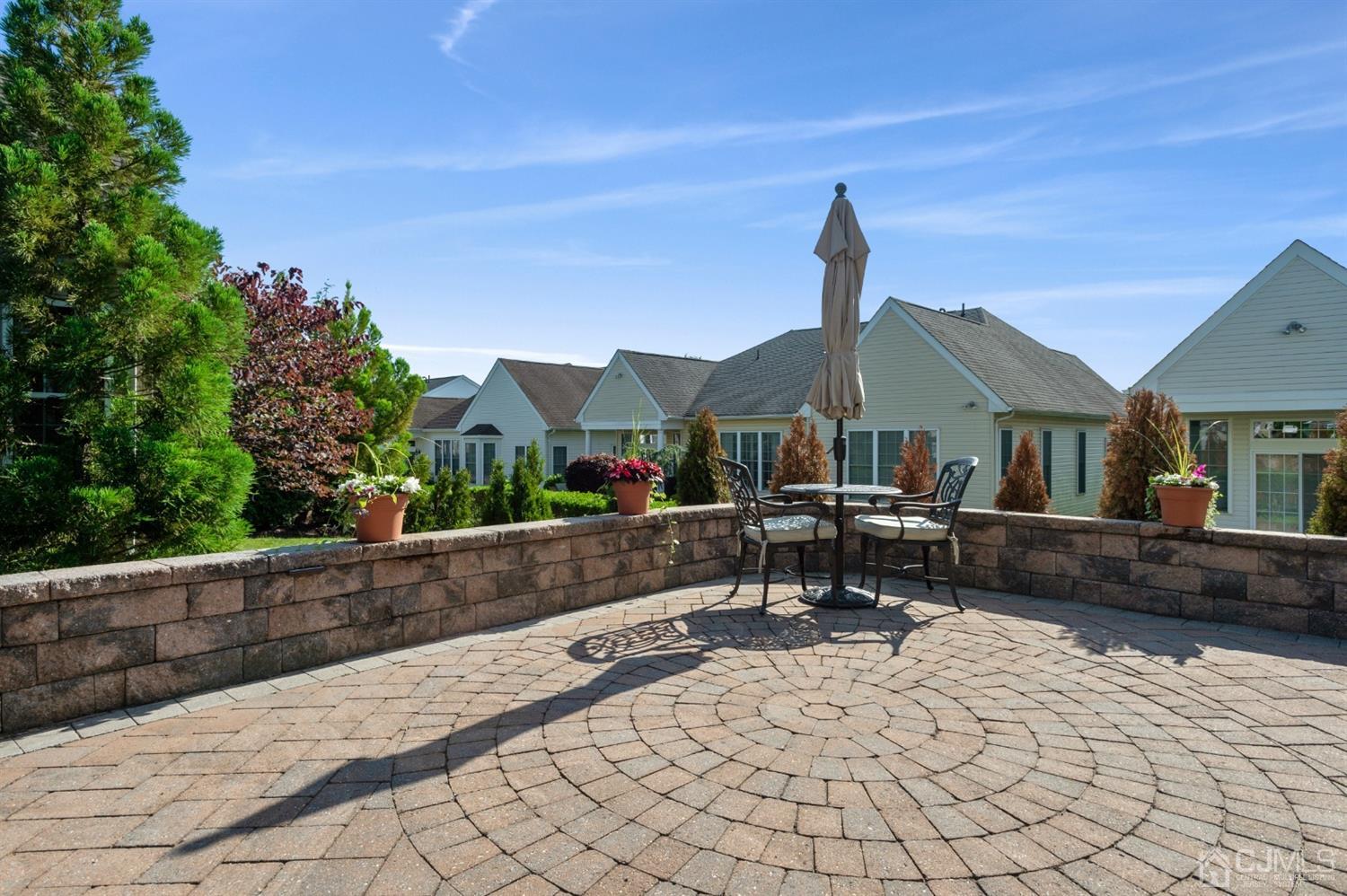57 Kings Mill Road Monroe Township, NJ 08831 - Photo 29 of 44 Custom Brick Paver Patio with Sitting Wall and Landscaping