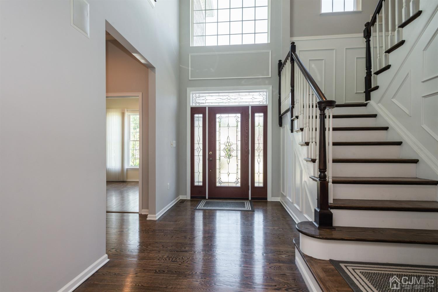 57 Kings Mill Road Monroe Township, NJ 08831 - Photo 4 of 44 Unique Entry - Two-Story - Light & Bright - Hardwood Floors - Etched Glass Door - Custom Moldings - Wood Staircase