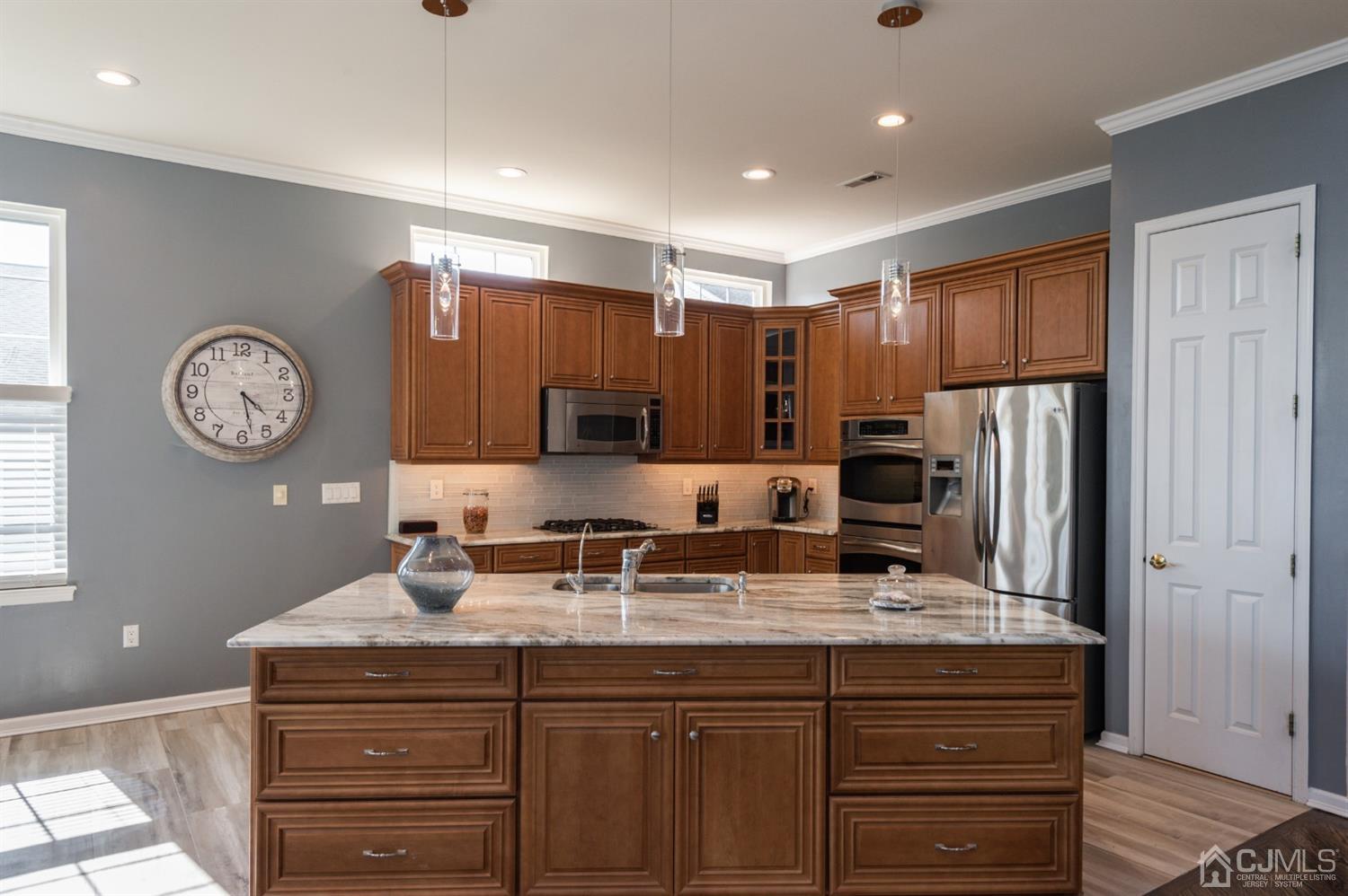 57 Kings Mill Road Monroe Township, NJ 08831 - Photo 6 of 44 Fantastic Kitchen with Oversized Low Center Island Topped with Granite - Under the Counter Lighting - Double Oven - Extra Cabinetry and Dynamite NEW Ceramic Tile Floor