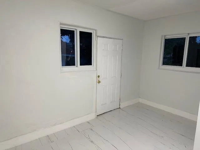 an empty room with a window