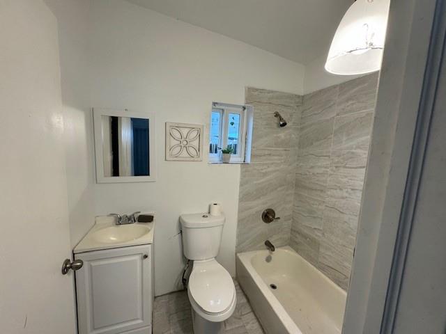 55 Northwest 47th Street Miami, FL 33127 - Photo 26 of 31 a white toilet sitting next to a bath tub