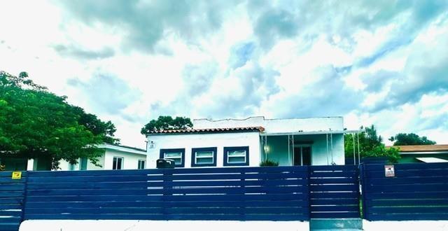 55 Northwest 47th Street Miami, FL 33127 - Photo 4 of 31 a view of front of house with a yard