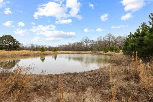 a view of a lake next to a building