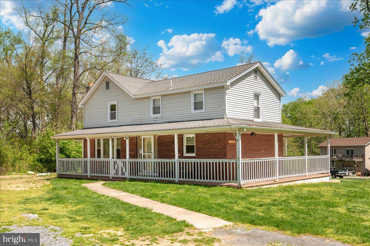 7010 Old Pryor Road Thurmont, MD 21788 - Photo 3 of 62 a view of a house with a yard